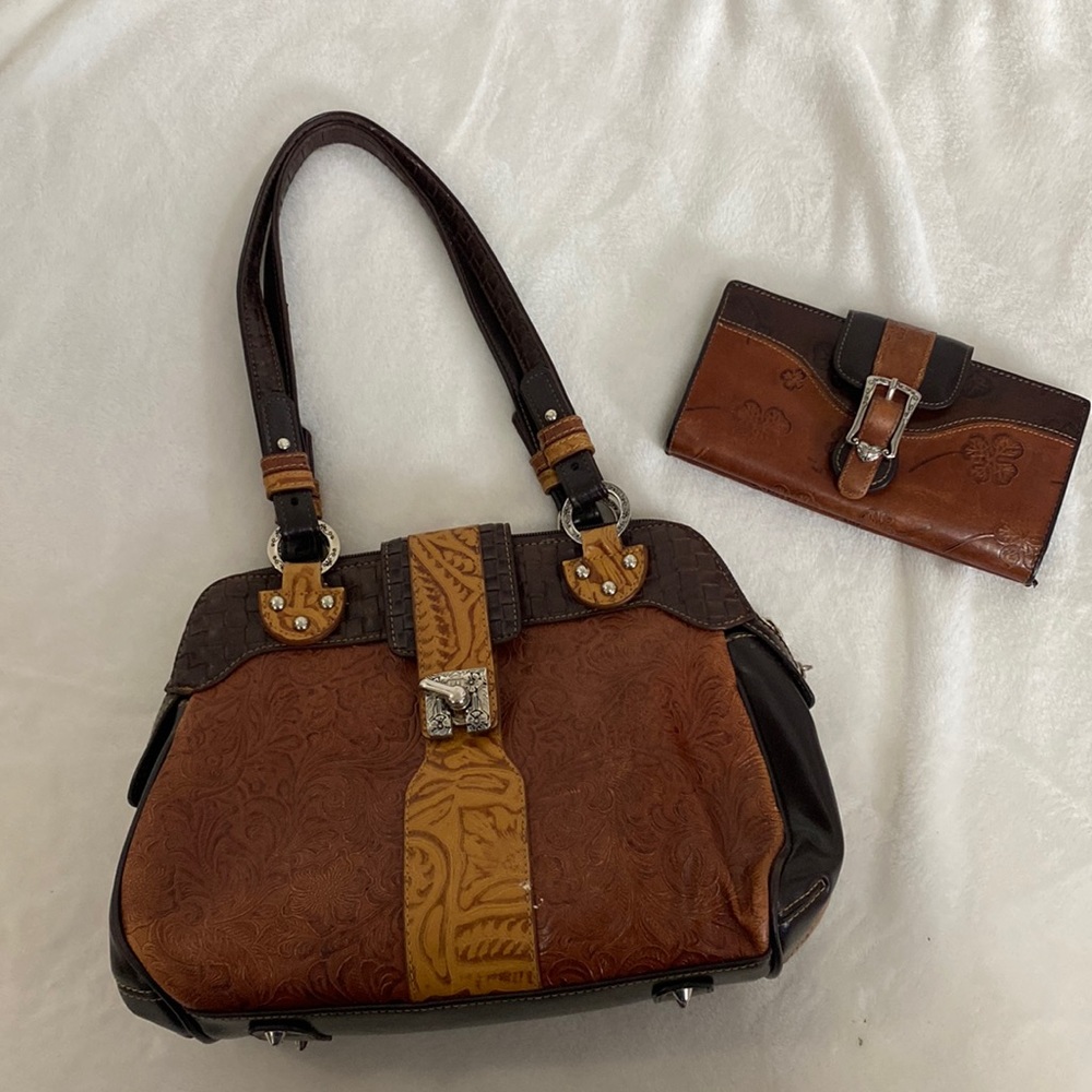Leather purse and wallet. Very unique design pressed into the leather.